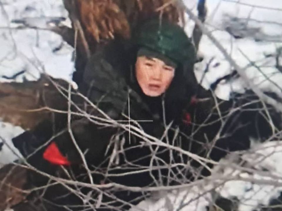 Passengers wait‌ in ‍a crowded airport terminal⁤ amidst flight cancellations.