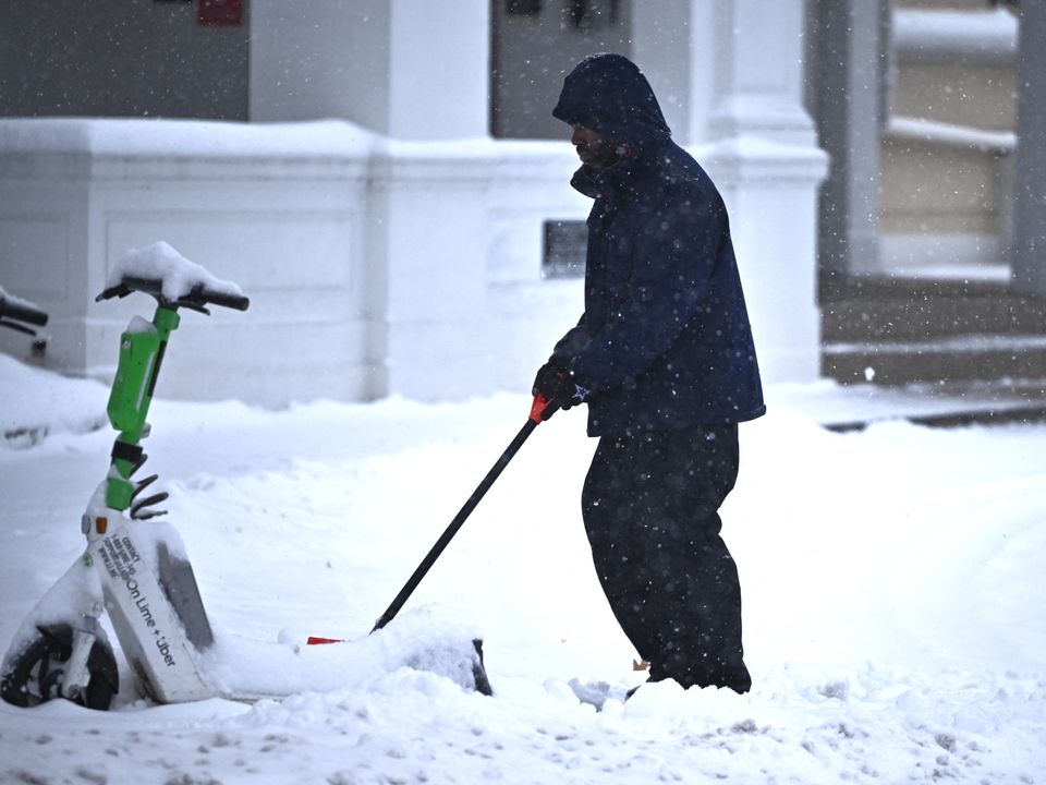 A vibrant fire rainbow arches across the sky.