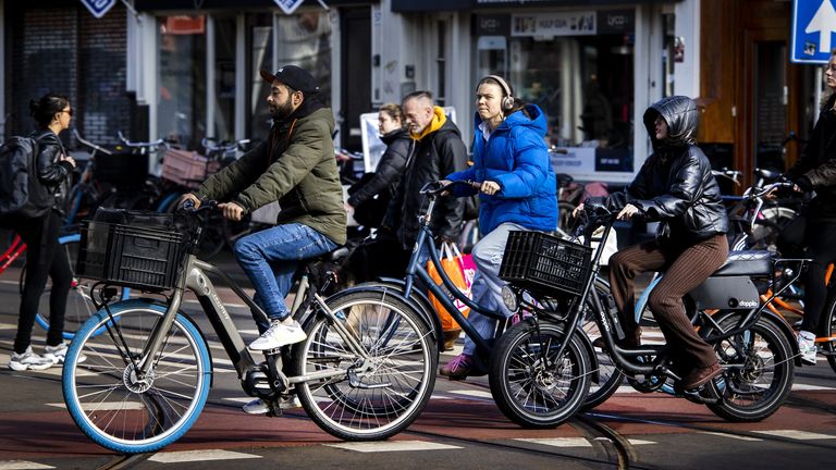 Cyclists in ​Amsterdam without helmets