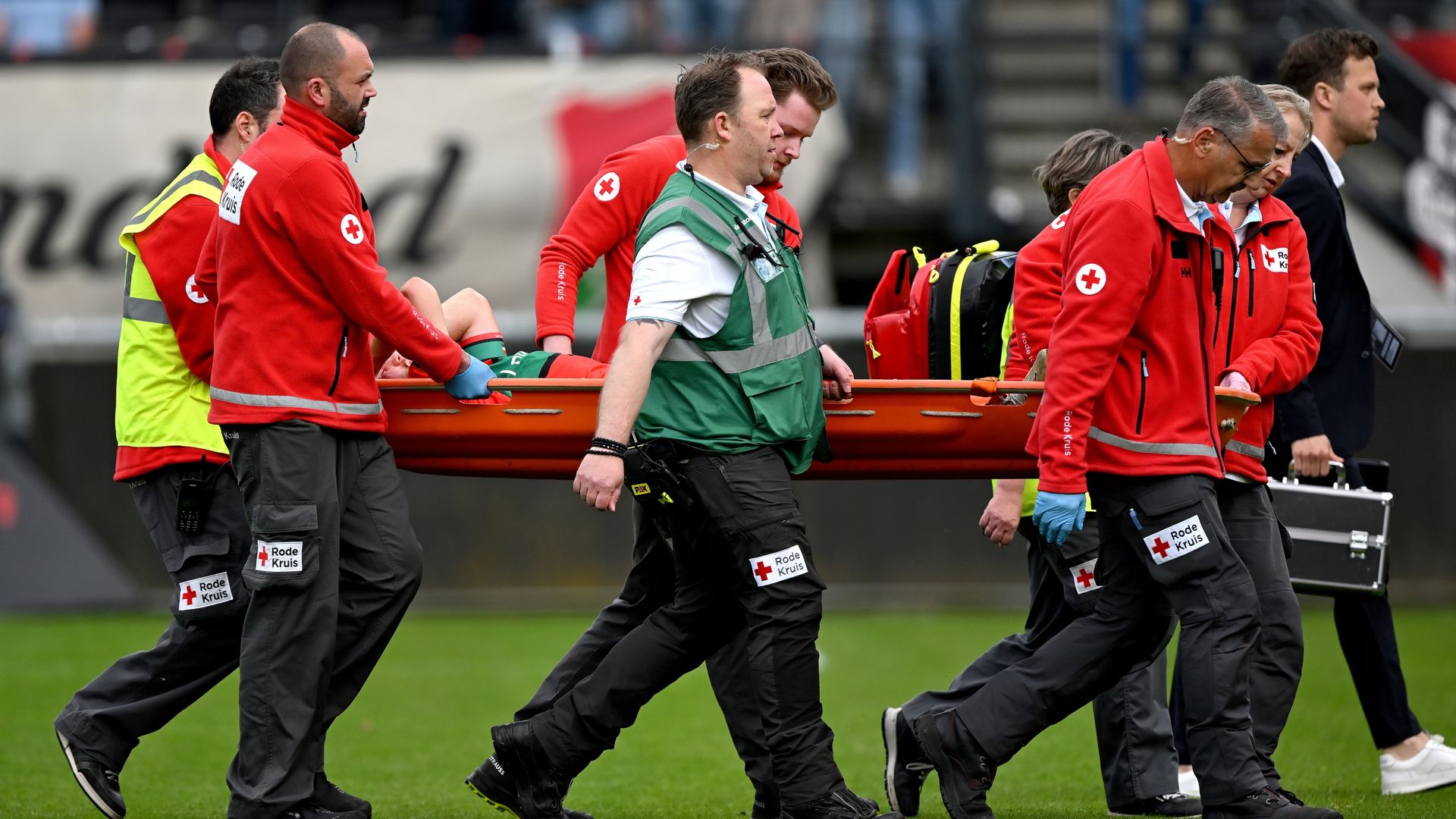 dirk Proper on a stretcher