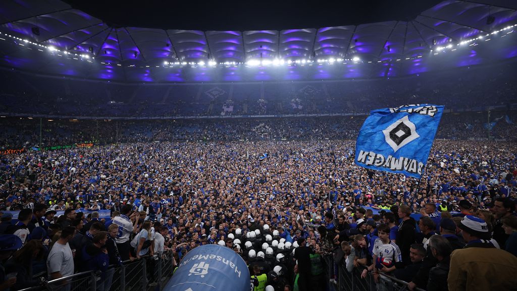 Fans storming the field after a game