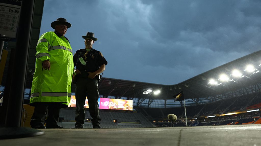 Soccer match temporarily suspended due to weather conditions