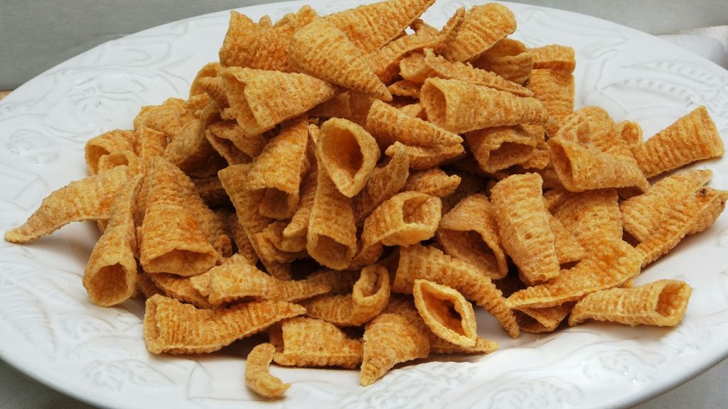 Terugroepactie voor zakken Bugles en Wokkels, olie aangetroffen in chips
