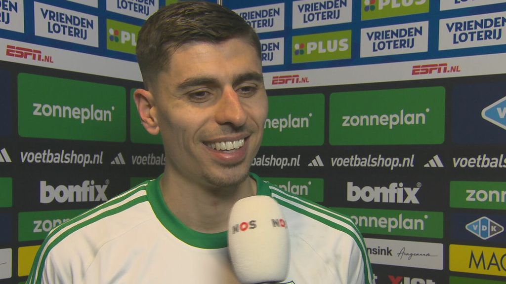 Kostons celebrating a goal with a smile