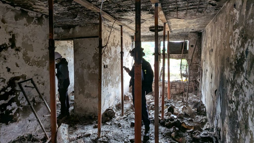 Bewoners fatale flatbrand Hongkong terug om woning te bekijken